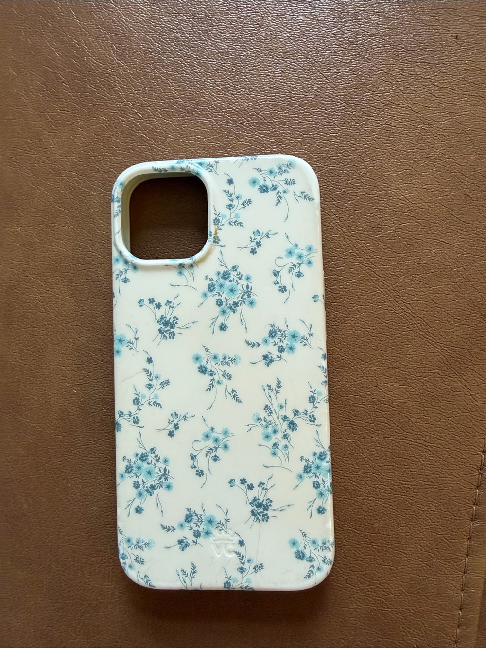 Velvet Caviar Cream Floral IPhone 14 Case with Blue Flowers